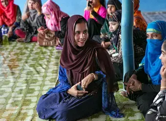 Lucky leads a planning session on joint action to address challenges, issues, and demands on gender equality and the empowerment of women and girls during the Rohingya women leaders meeting at the UN Women multi-purpose women’s centre. Photo: UN Women/Allison Joyce.
